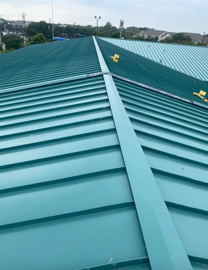 Green commercial metal roof ridge and valley for Metal Roof Repair in Moss Bluff